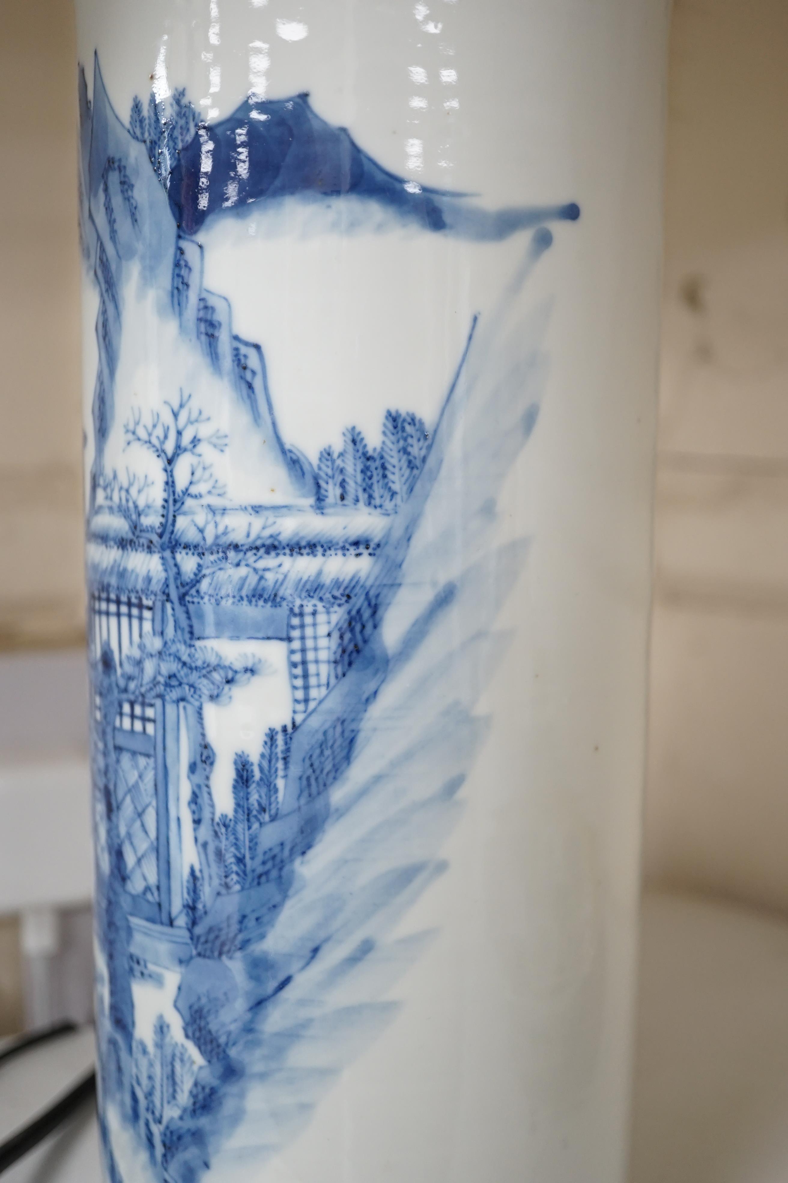 A Chinese blue and white ‘sages’ cylindrical brushpot, 19th century